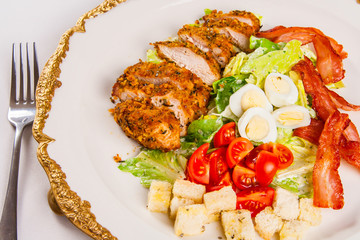 Caesar salad with chicken and bacon