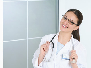 Portrait of smiling medical doctor woman with stethoscope