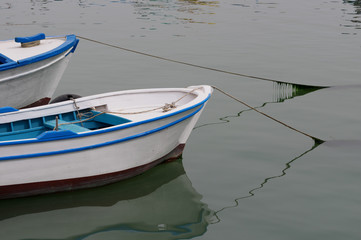 Fototapeta na wymiar fishing boat reflection