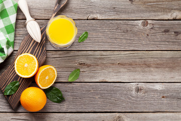 Fresh ripe oranges and juice