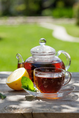 Breakfast tea on table in garden