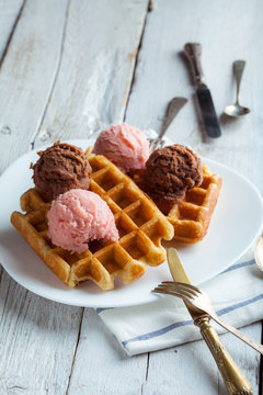 Tasty Waffle with Cream, Chocolate and Strawberry Ice Cream