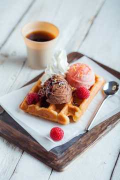 Tasty Waffle with Cream, Chocolate and Strawberry Ice Cream