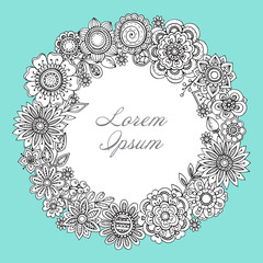 Vector Greeting card template with hand drawn floral wreath.