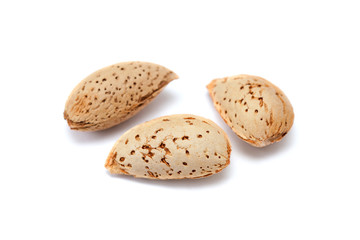 the almond nuts in shell isolated on white background