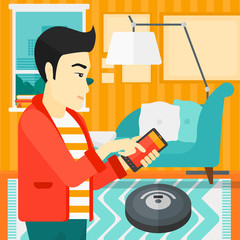 Man with robot vacuum cleaner.