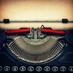 Antique typewriter. Vintage style toned photo