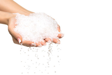 Fototapeta premium Sea salt crystals in women hand