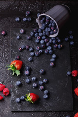 Fototapeta na wymiar Blueberries, dark rustic style