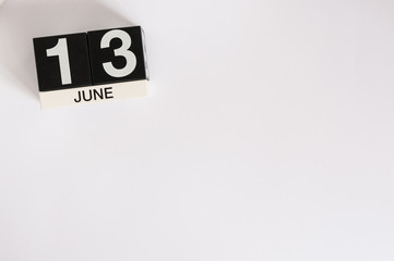 June 13th. Image of june 13 wooden color calendar on white background. Summer day. Empty space for...