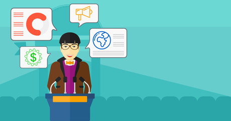 Man speaking on podium.