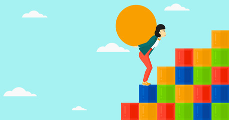 Woman carrying stone.