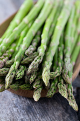 asparagus on wooden surface