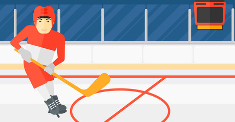 Ice-hockey player with stick.