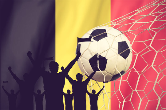 silhouettes of Soccer fans with flag of Belgium.Cheer Concept vi