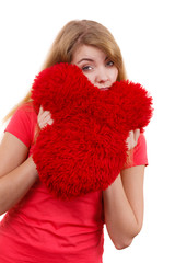 Woman sad girl hugging red heart love symbol