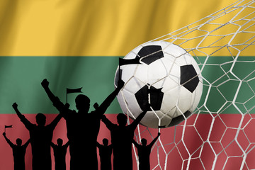 silhouettes of Soccer fans with flag of Lithuania .Cheer Concept