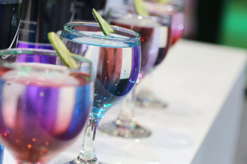 colorful cocktail in wine glass