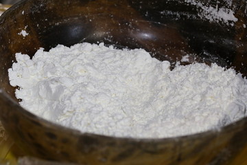 flour in wood bowl