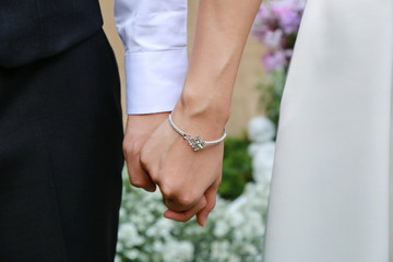 Fototapeta premium couple man and women hold hand togethe