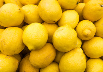 yellow lemons textures backgrounds.  Group of fresh lemons.