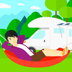 Man lying in hammock.