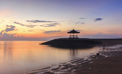 Fototapeta na wymiar A Beautiful Balinese Pagoda on the beach at Sanur, Bali, Indonesia