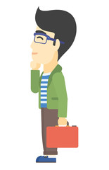 Man looking at departure board.