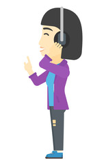 Woman listening music in headphones