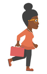 Business woman walking with briefcase.