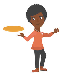 Woman playing flying disc.