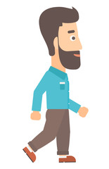 Smiling businessman walking