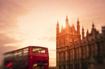 Fototapeta na wymiar Bus in London against Westminster building