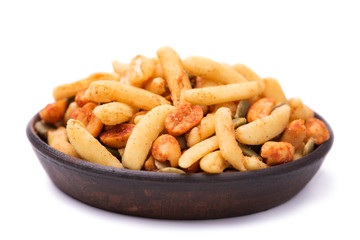 Nuts and crackers to beer isolated on white background
