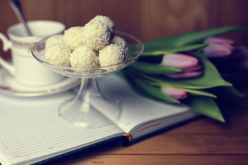 flower on the book and tea