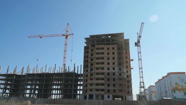 Construction of multi-storey buildings.Cranes work