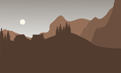 Silhouette of house on the mountain