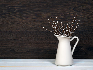 Willow Bunch in white jug. Decorative willow branches. Wood White regiment. Wooden dark wall. interior Detail 