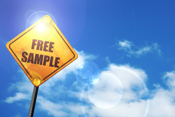 Yellow road sign with a blue sky and white clouds: free sample s