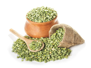 dried green peas  in bowl and spoon 