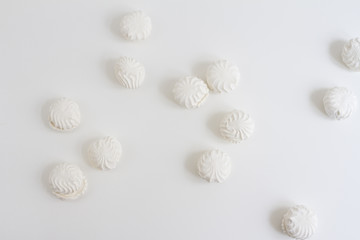 Top view of Latvian marshmallovs - zefiri on white background