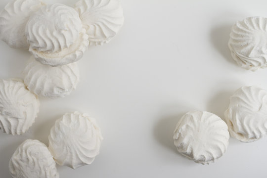 Top view of Latvian marshmallovs - zefiri on white background