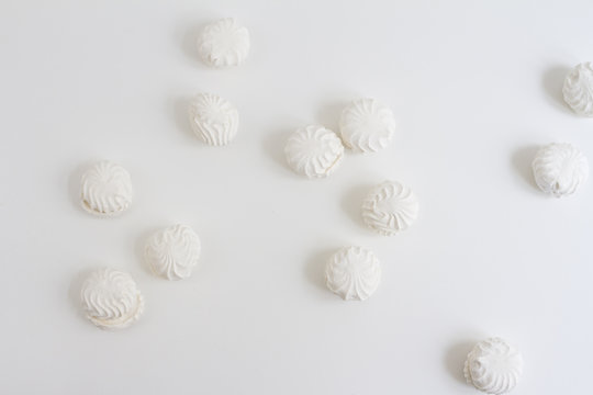 Top view of Latvian marshmallovs - zefiri on white background