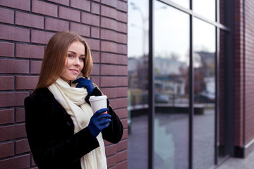 Fototapeta premium Gorgeous blonde with coffee to go