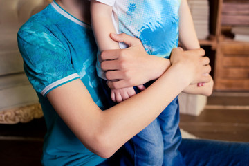 Close up of brother hands, family concept