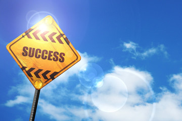 Yellow road sign with a blue sky and white clouds: Success sign 