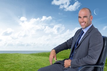 Composite image of portrait of confident businessman