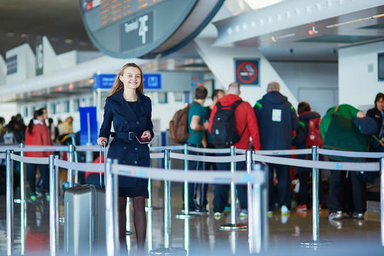 Young female traveler in international airport