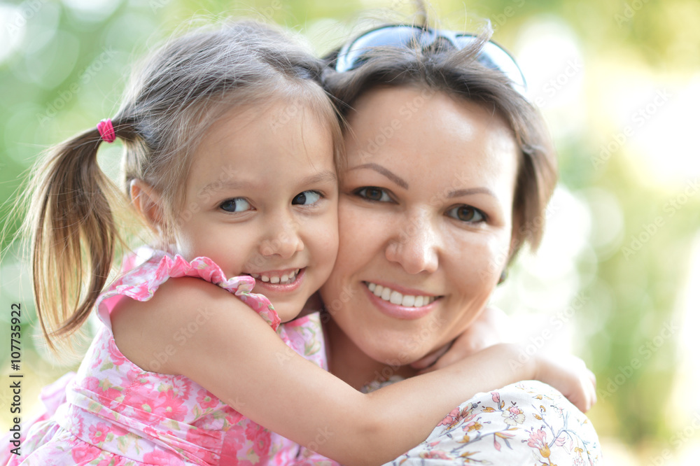 Poster Little girl with mother in park