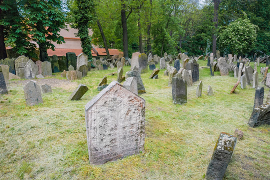 Ancient Jewish cemetery with detailed view of tombstones and engravings and symbols. Also known as Jewish Garden. Old Prague, Czech republic